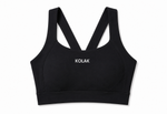 Itim na sports bra na may 'KOLAK' na tatak sa puting background