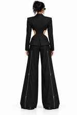 MODEL 05 — NYRA | Women's CIRCUIT 001 LOOK 01, full outfit back view with the Tailored Slacks 001 outer-leg zipper system clearly visible against a seamless white background; digital concept render.