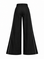 Women's Circuit 001 slacks black — isolated back view on pure white background with pant-leg zipper visible, digital design concept render.
